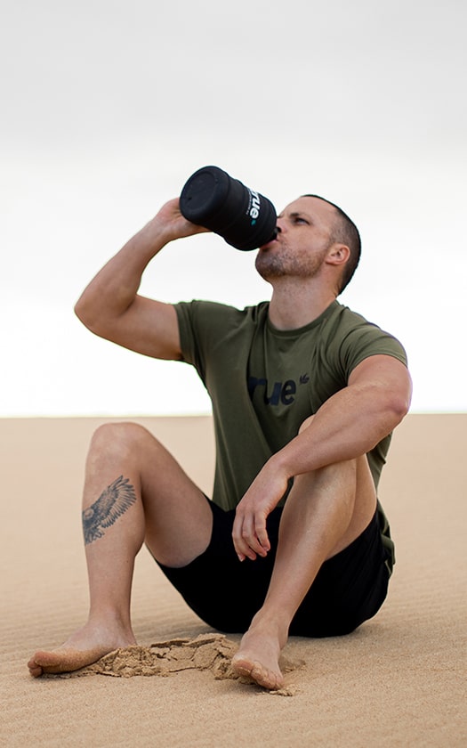 Athlete Drinking from True Bottle